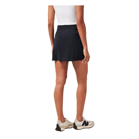 Travis Mathew Game Set Match Moveknit Golfrock, schwarz