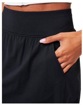 Travis Mathew Game Set Match Moveknit Golfrock, schwarz