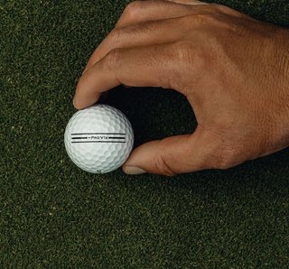 Titleist Pro V1x Left Dash AIM Enhanced Golfbälle