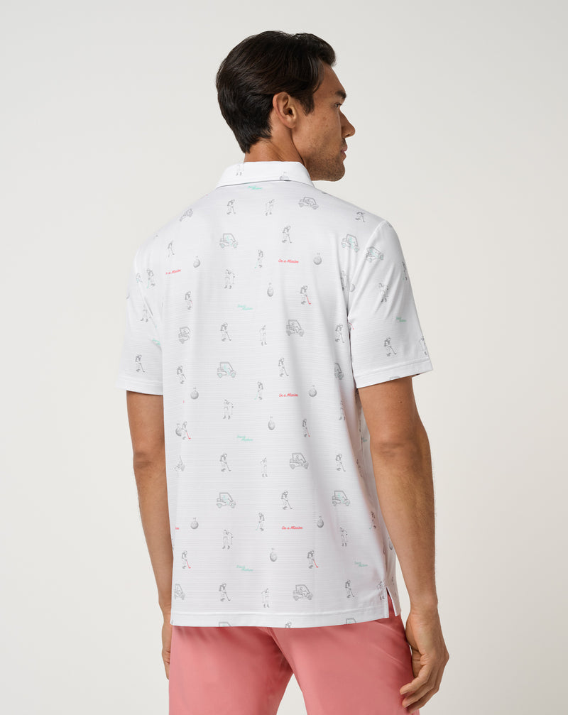 Travis Mathew On A Mission Polo – Detail der Streifenperforation und Astronautengrafik
