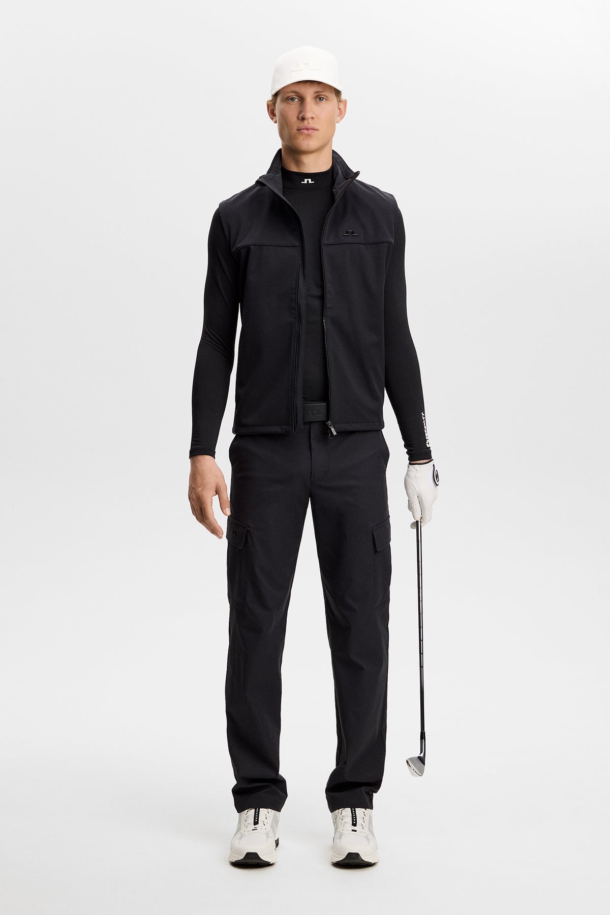J.Lindeberg Ello Brushed Top Black – feuchtigkeitsableitendes Performance-Gewebe