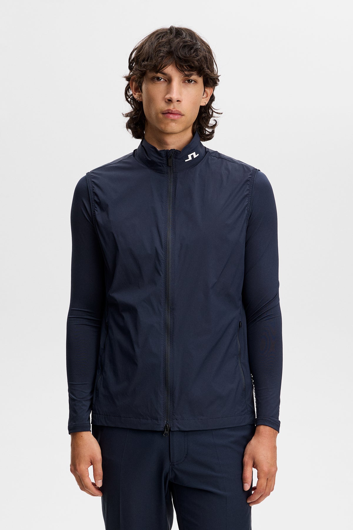 J.Lindeberg Tour Tech Packable Vest JL Navy – front view on course